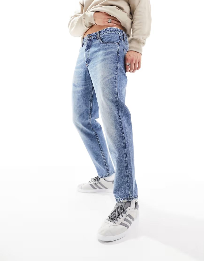 niebieskie spodnie jeans zamek
