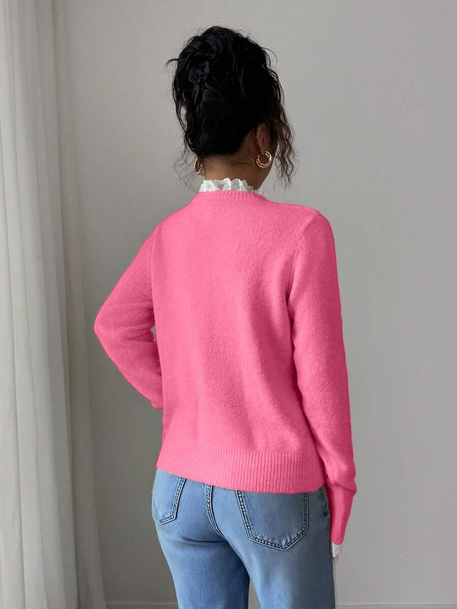 różowy sweter kardigan