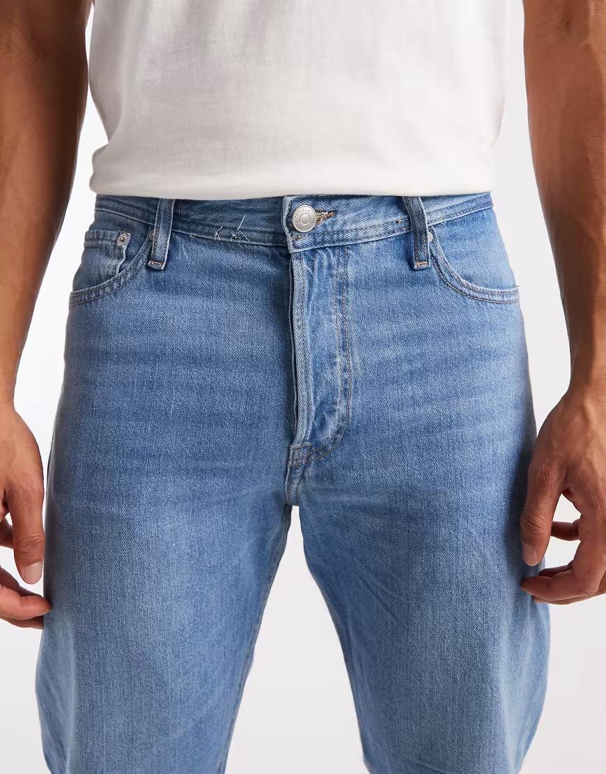 niebieskie spodnie jeans kieszenie