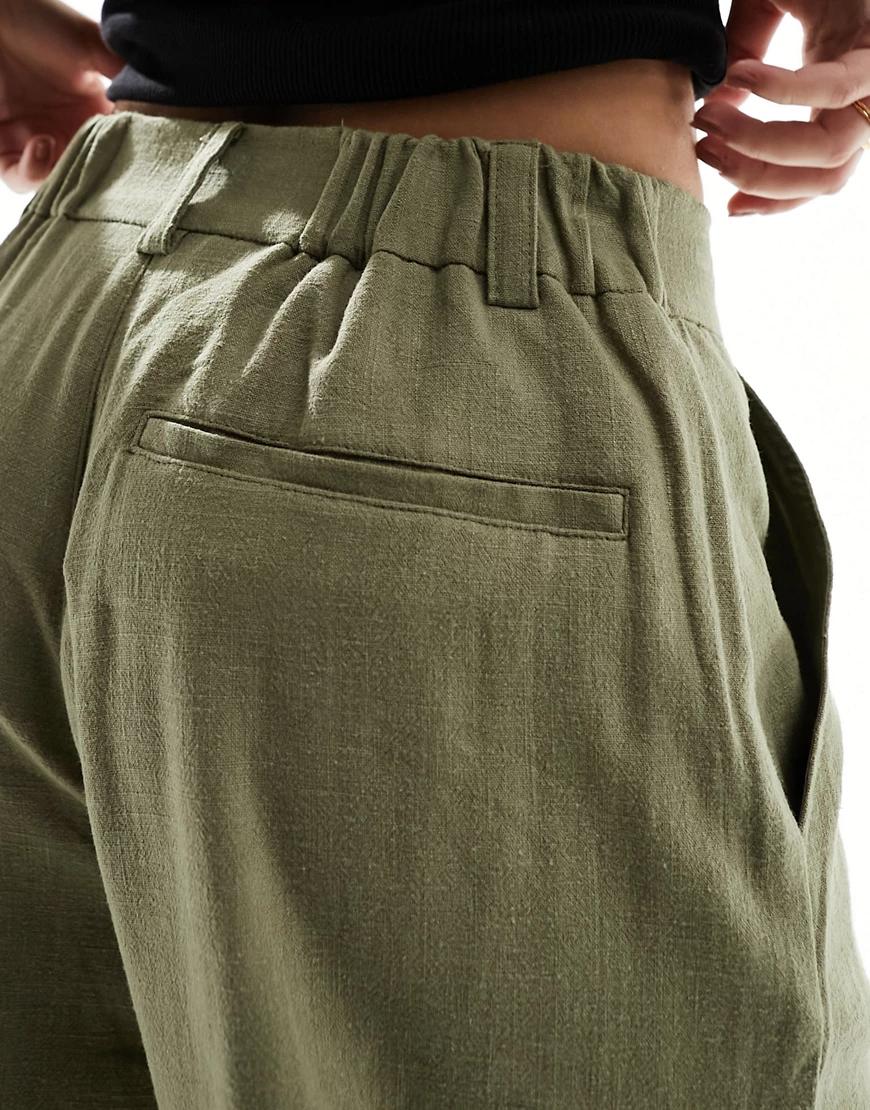 zielone spodnie rozszerzane nogawki causal
