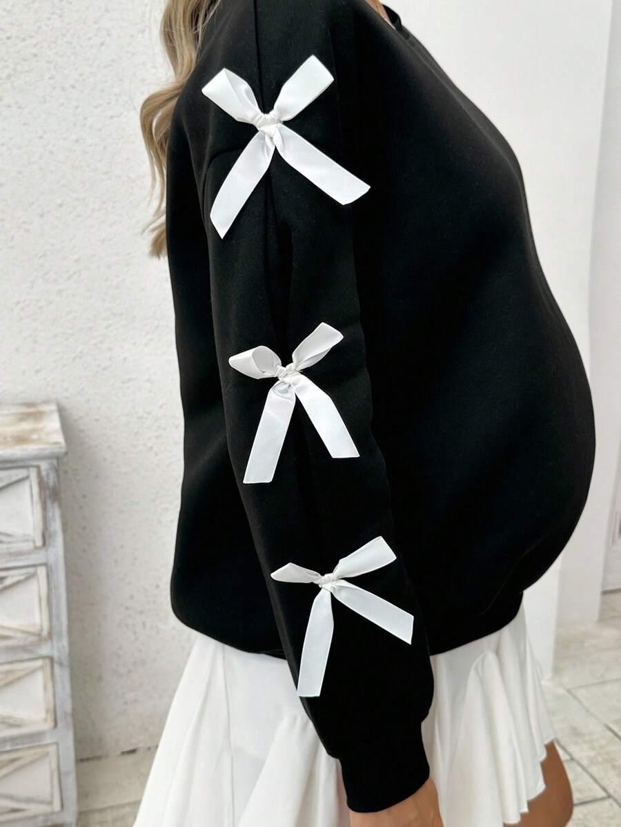 czarna bluza kokardy