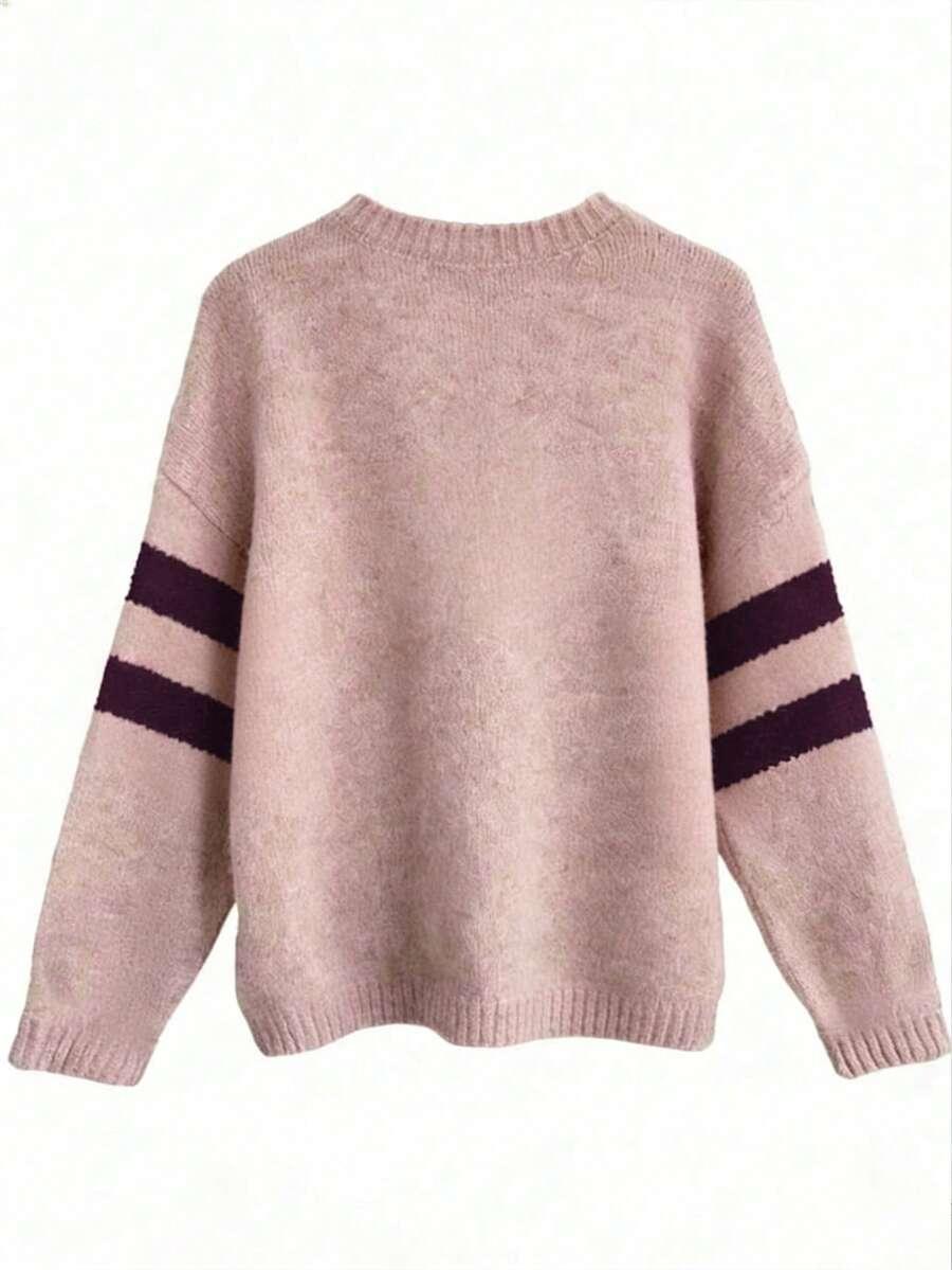różowy sweter wzór gwiazda 