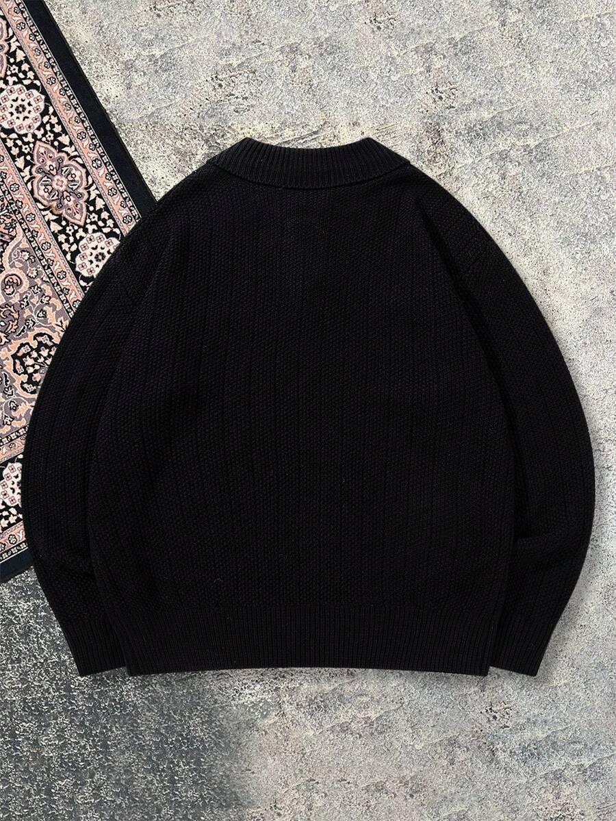 czarny sweter zamek
