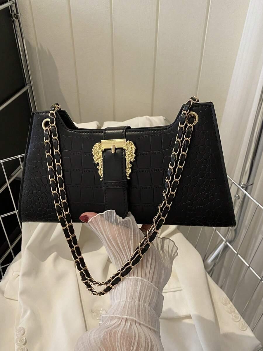 czarna torebka klamra