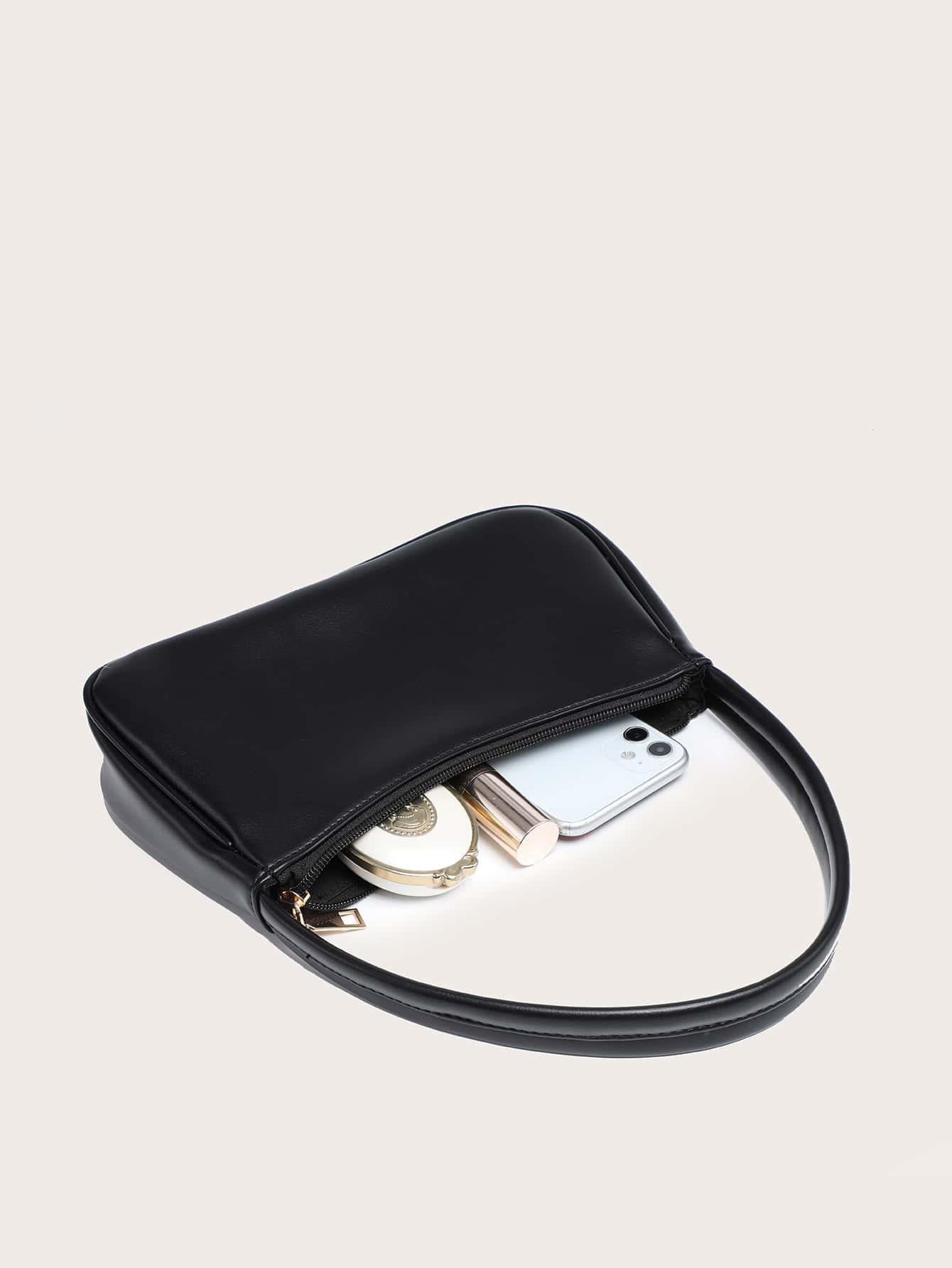 czarna torebka na ramię