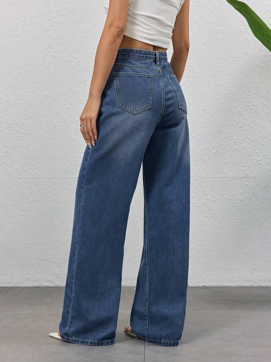 NIEBIESKIE SPODNIE JEANS asymetria