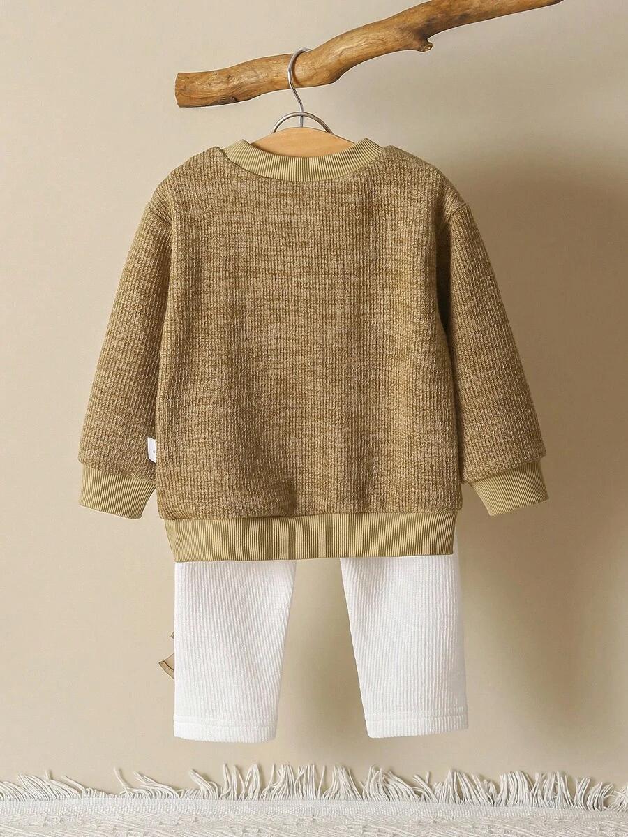 komplet sweter spodnie