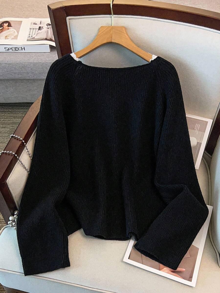 czarny sweter koronka 
