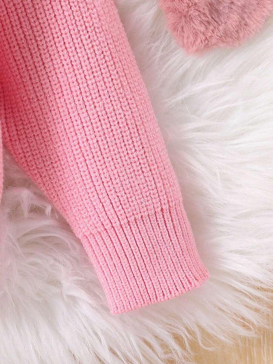 różowy sweter z golfem