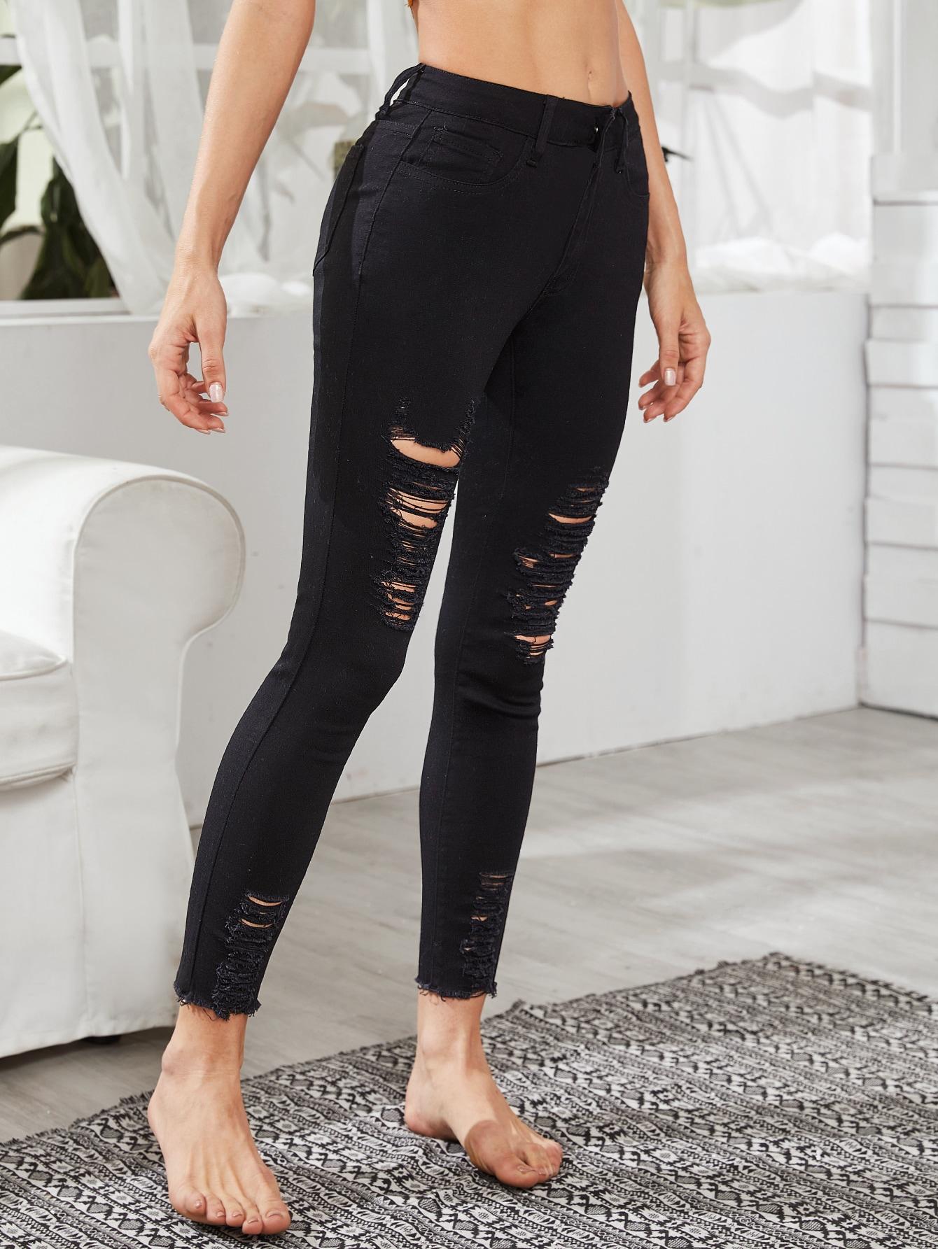CZARNE SPODNIE JEANS PRZETARCIA