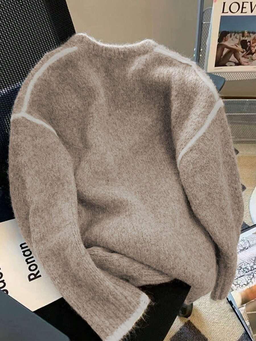 beżowy sweter z domieszką wełny