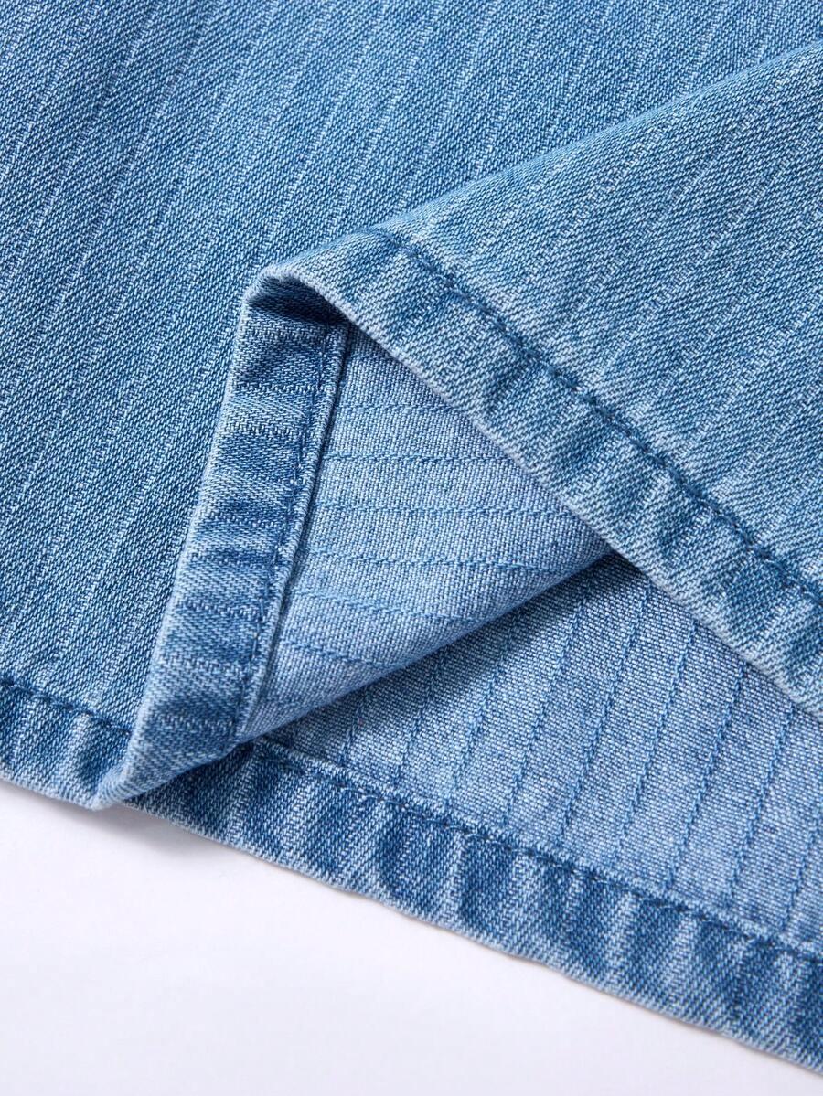 niebieski kombinezon jeans