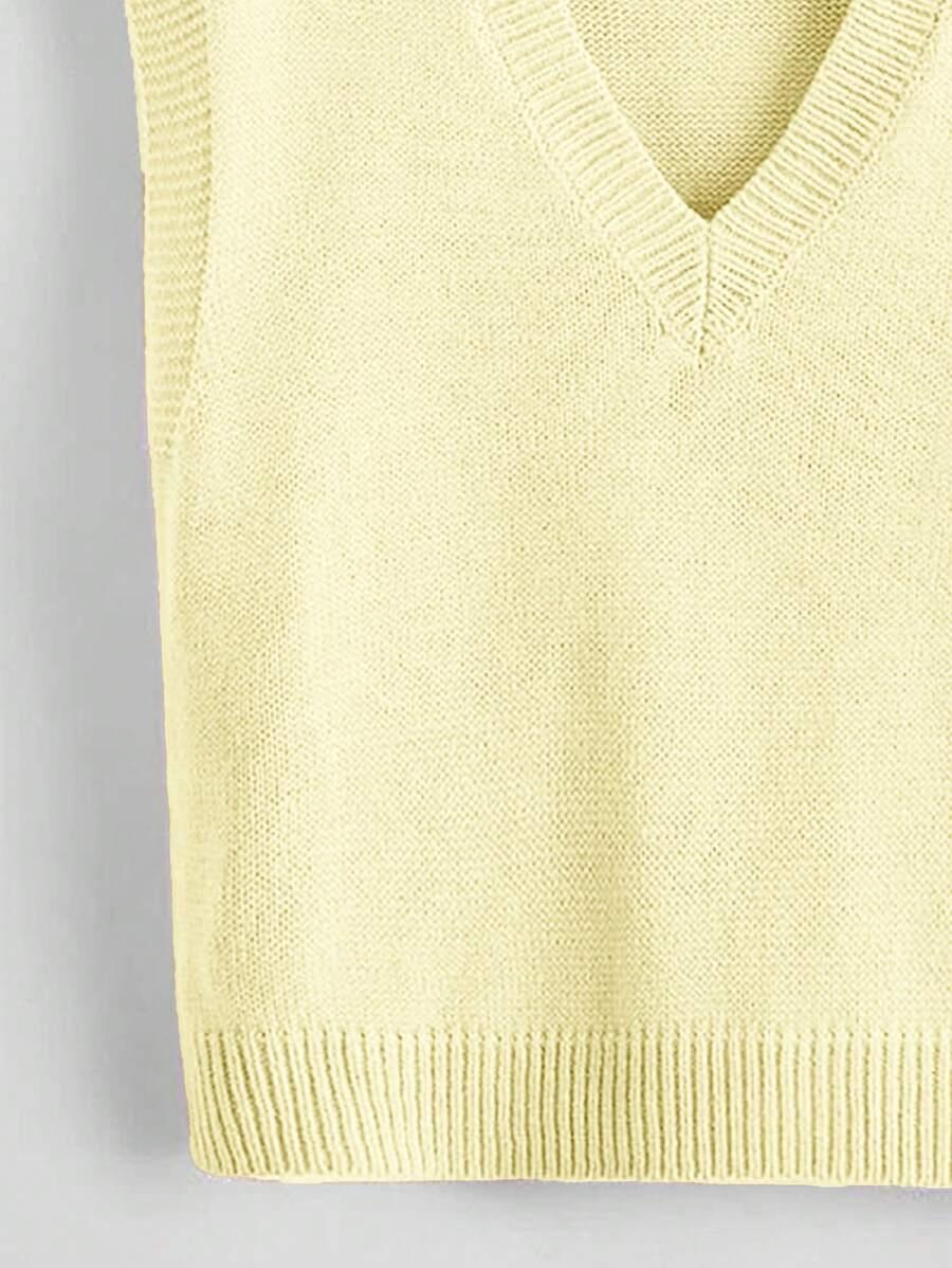żółty sweter bez rękawów v-neck