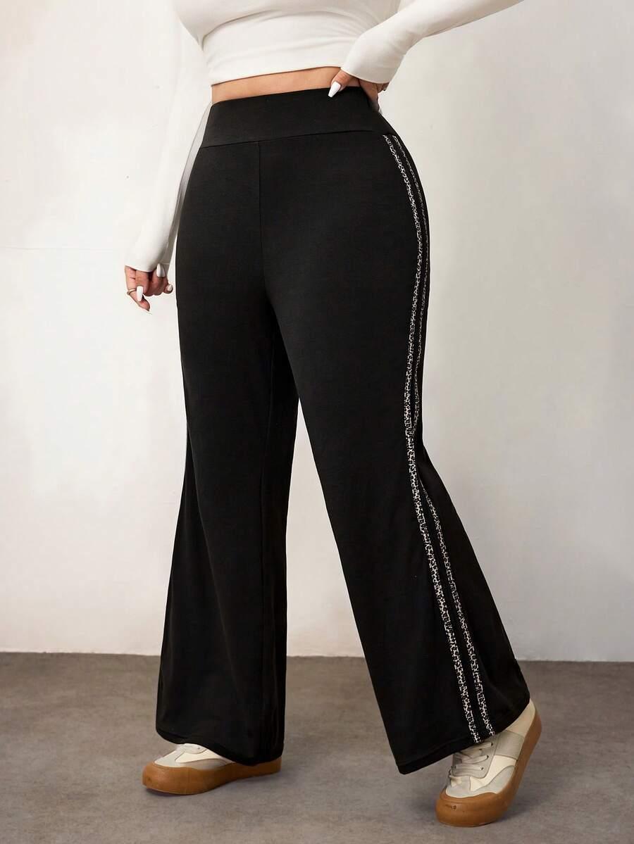 CZARNE SPODNIE DRESOWE animal print