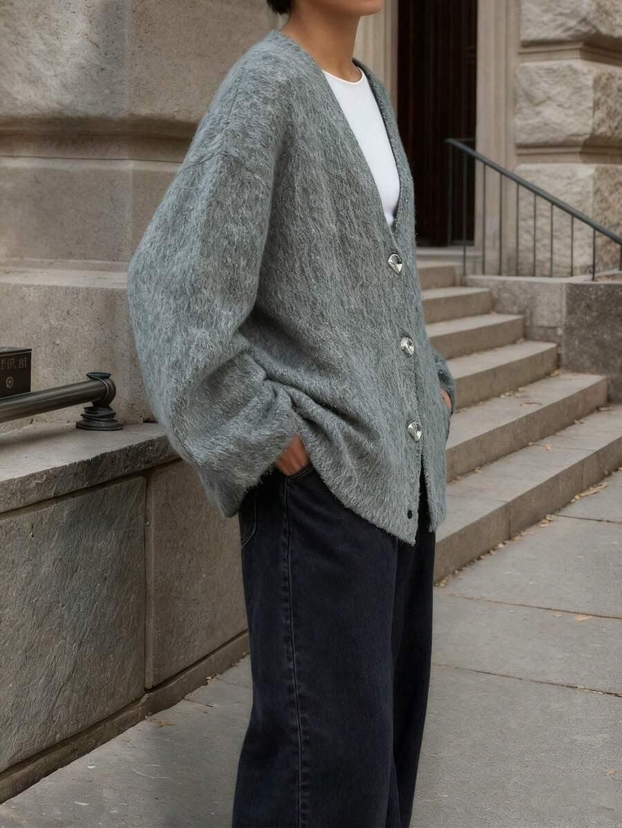 SZARY ROZPIANY SWETER 