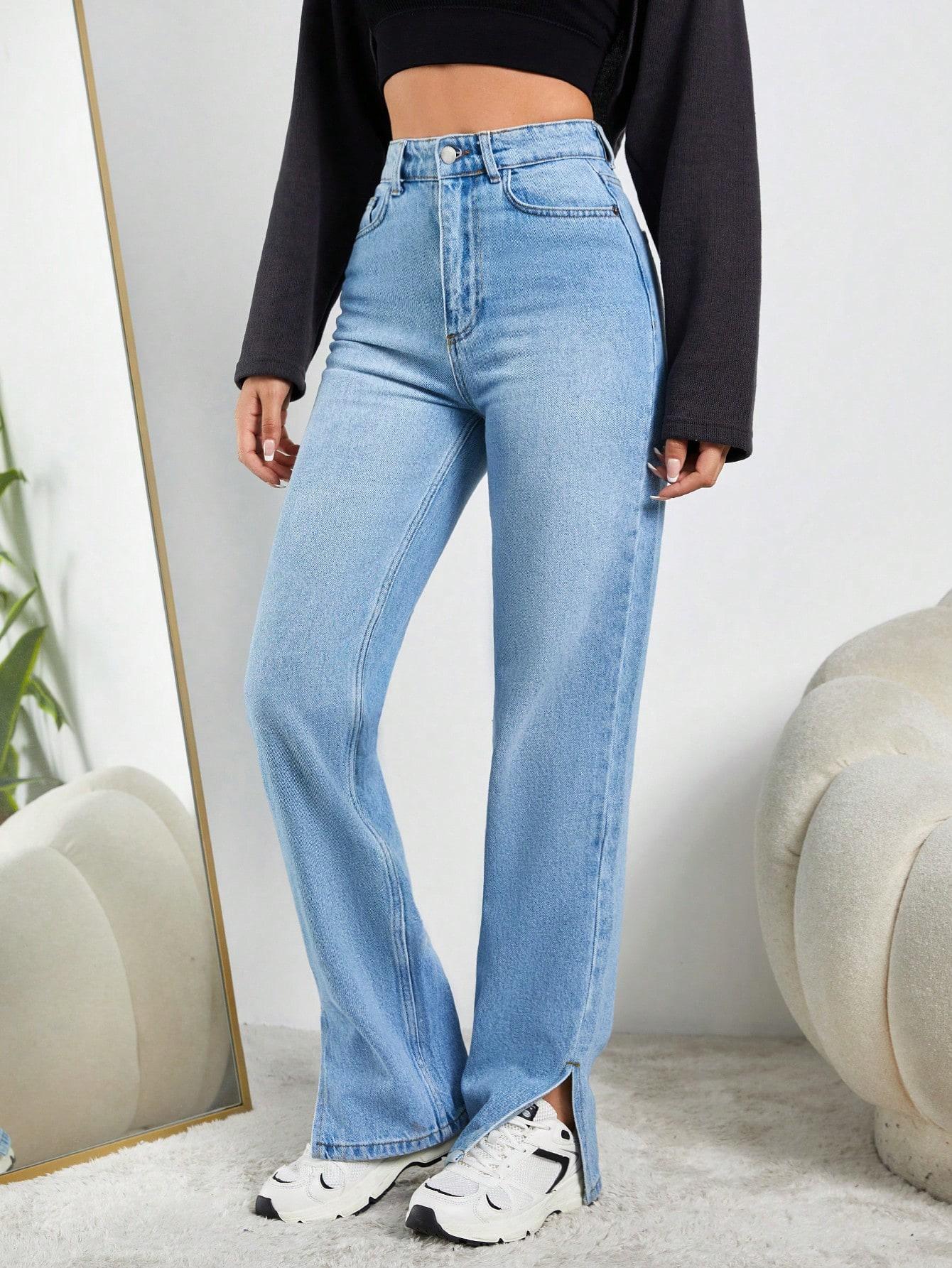 niebieskie spodnie jeans rozcięcia