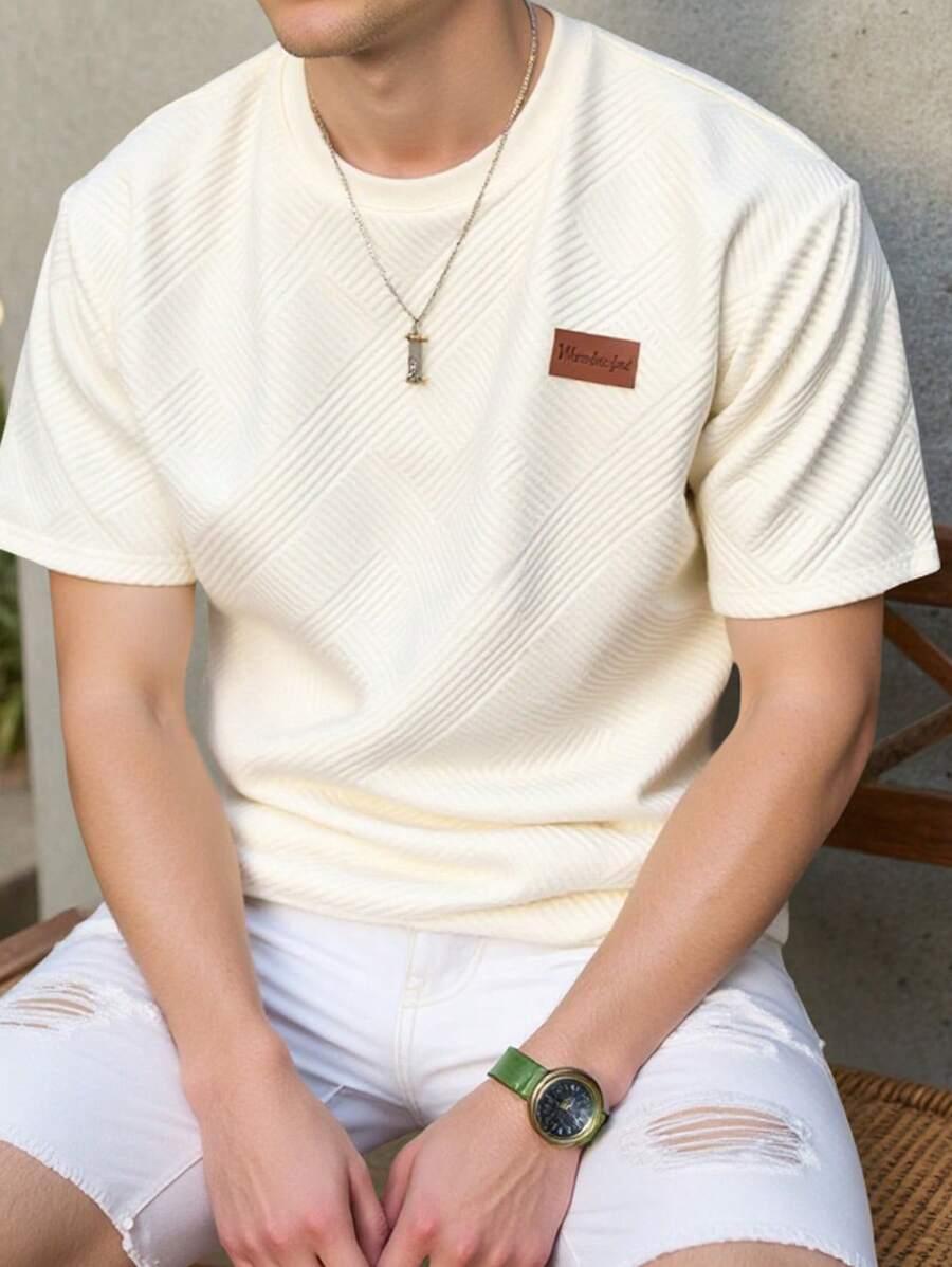 BEŻOWY T-SHIRT Z NASZYWKĄ