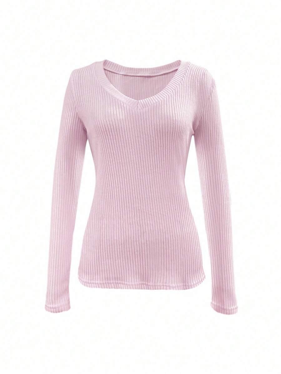 różowy sweter v-neck
