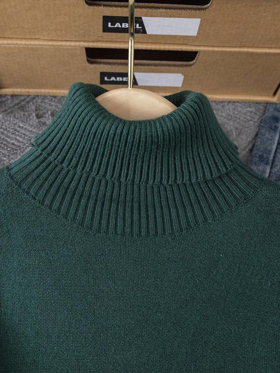 zielony ocieplany sweter