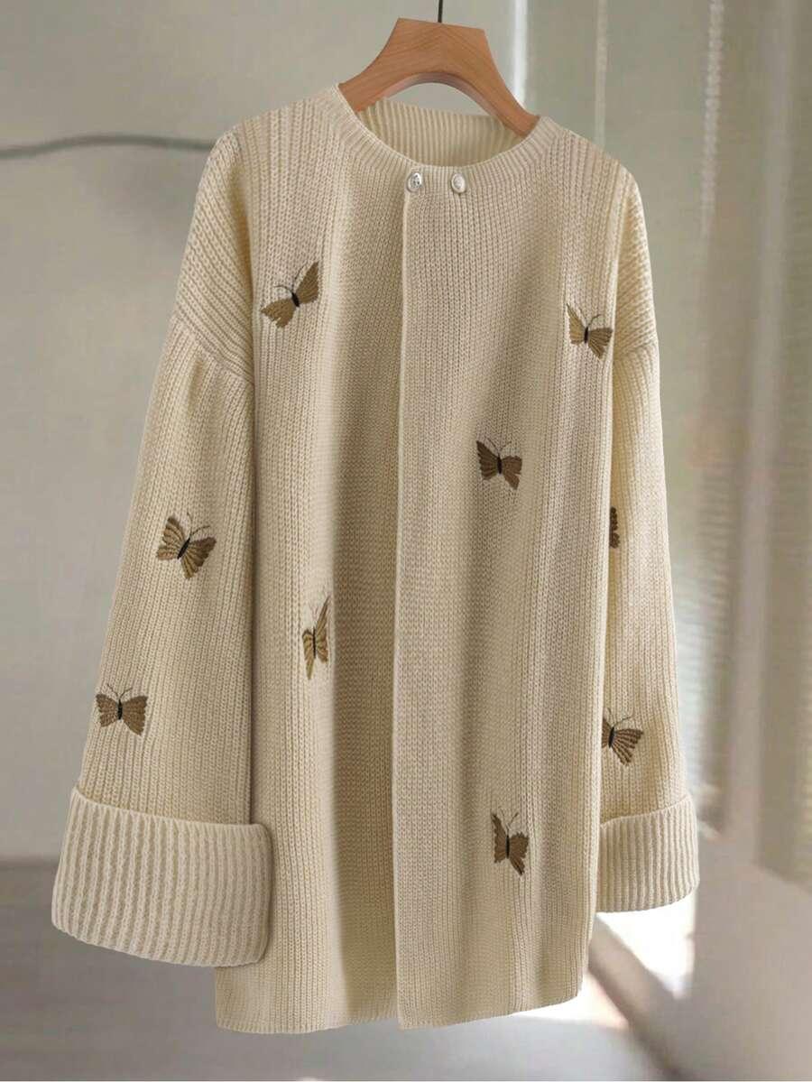 beżowy sweter haft