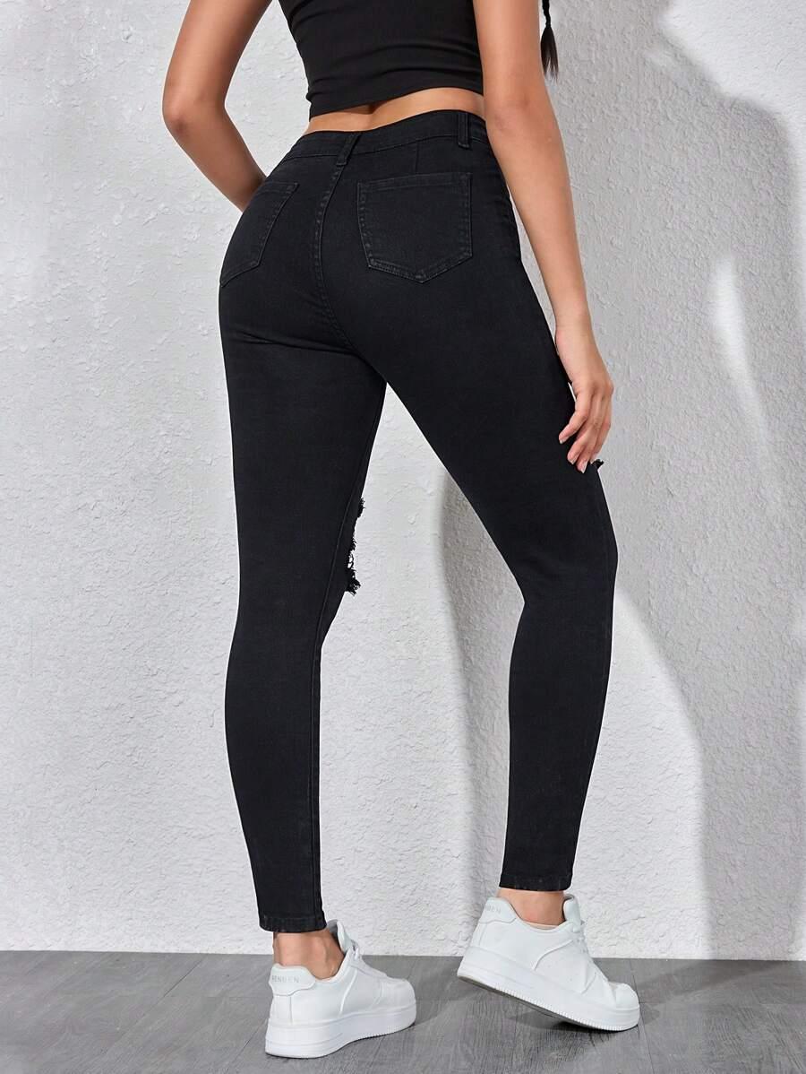 CZARNE SPODNIE JEANS PRZETARCIA 