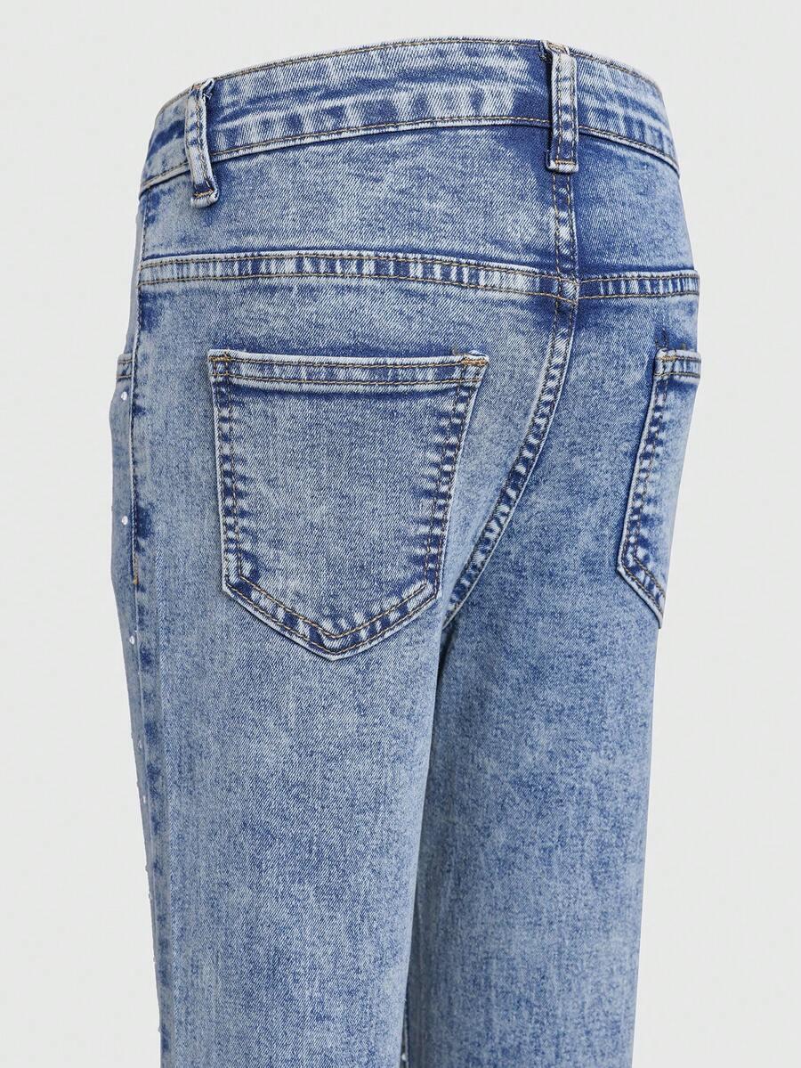 niebieskie spodnie jeans zdobienie