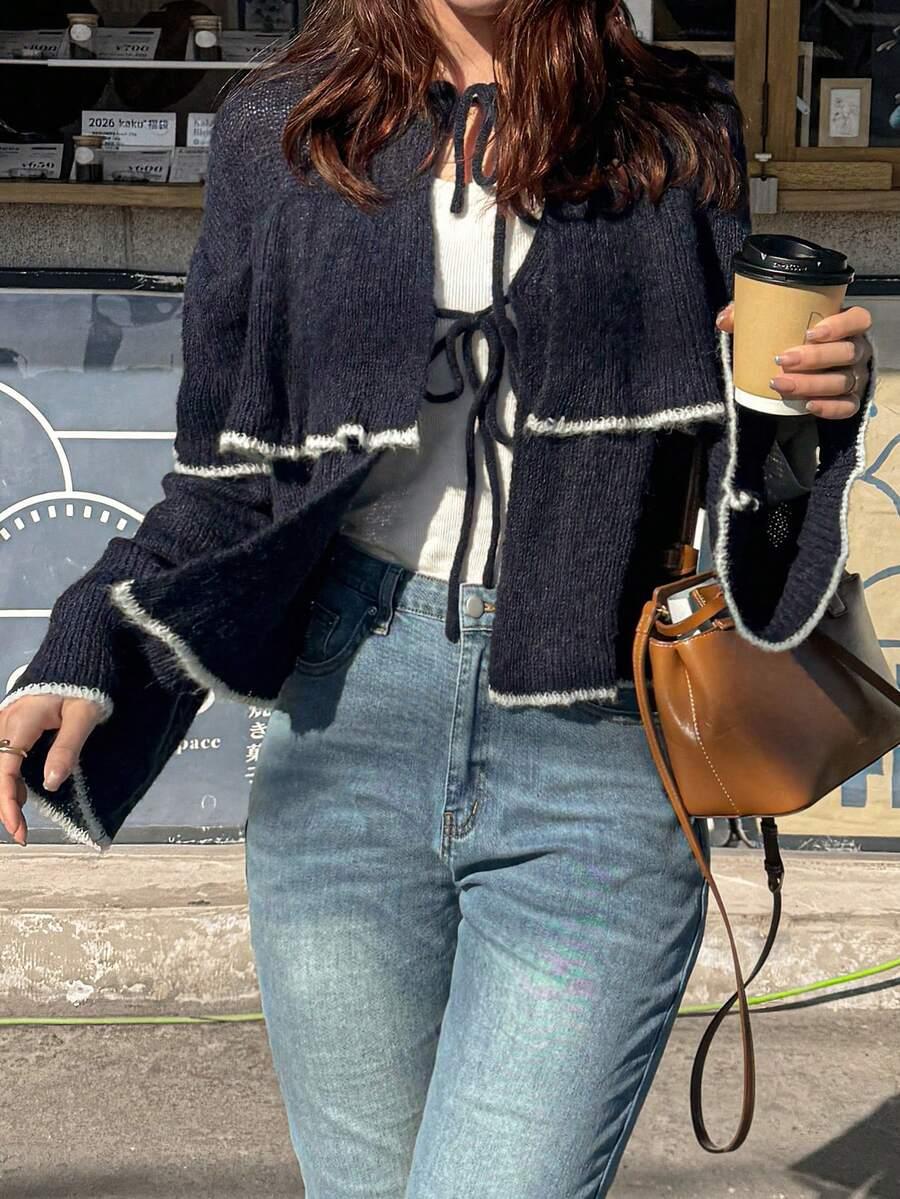 granatowy sweter wiązanie