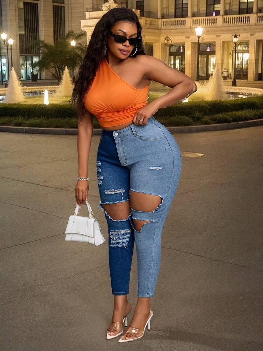 JEANSY DAMSKIE ASYMETRYCZNE 