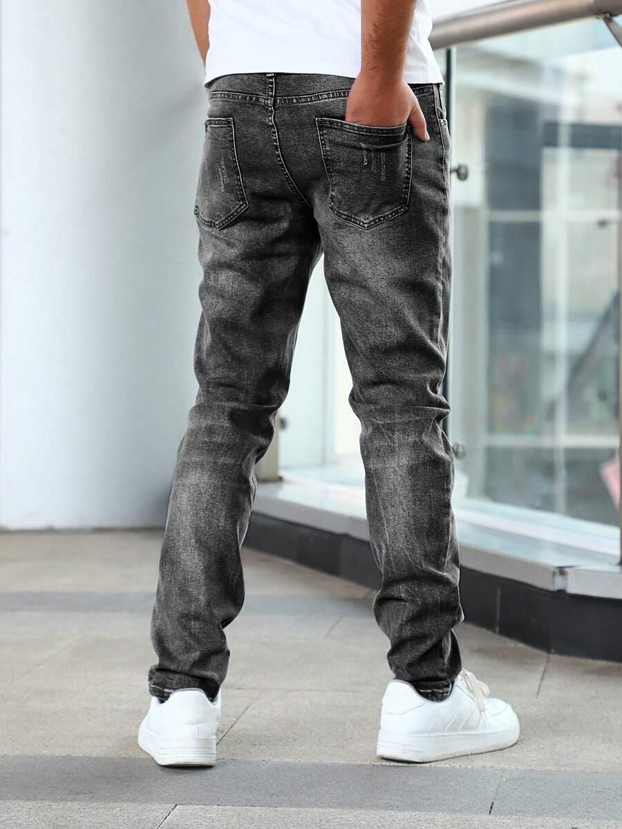 ZWĘŻANE SPODNIE JEANS
