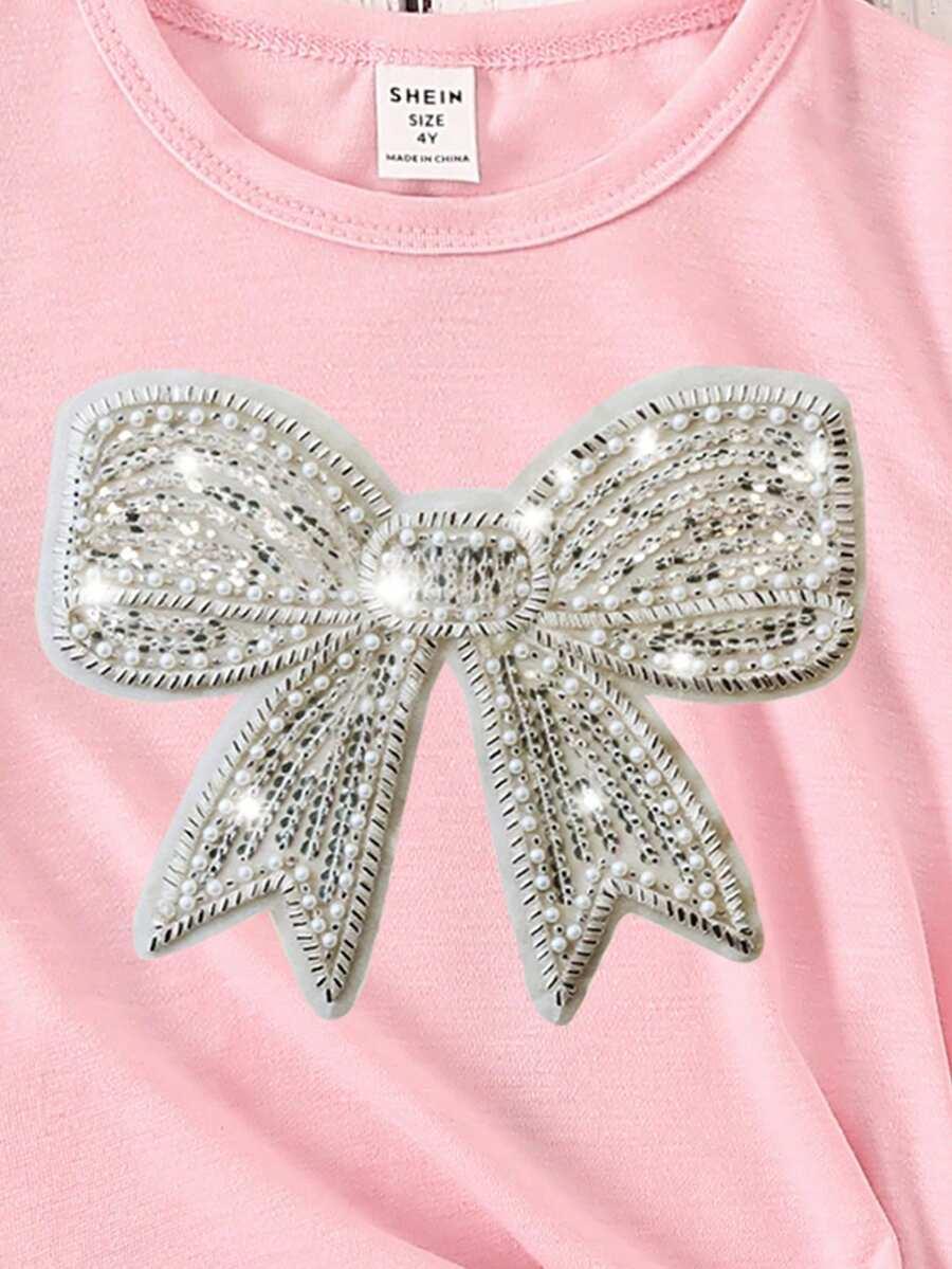 różowy t-shirt z nadrukiem