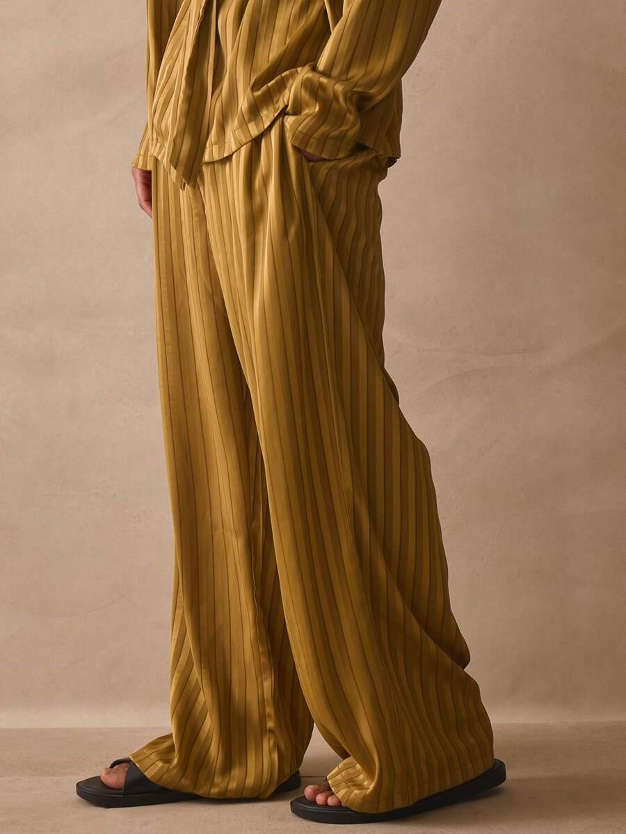 żółte spodnie wide leg