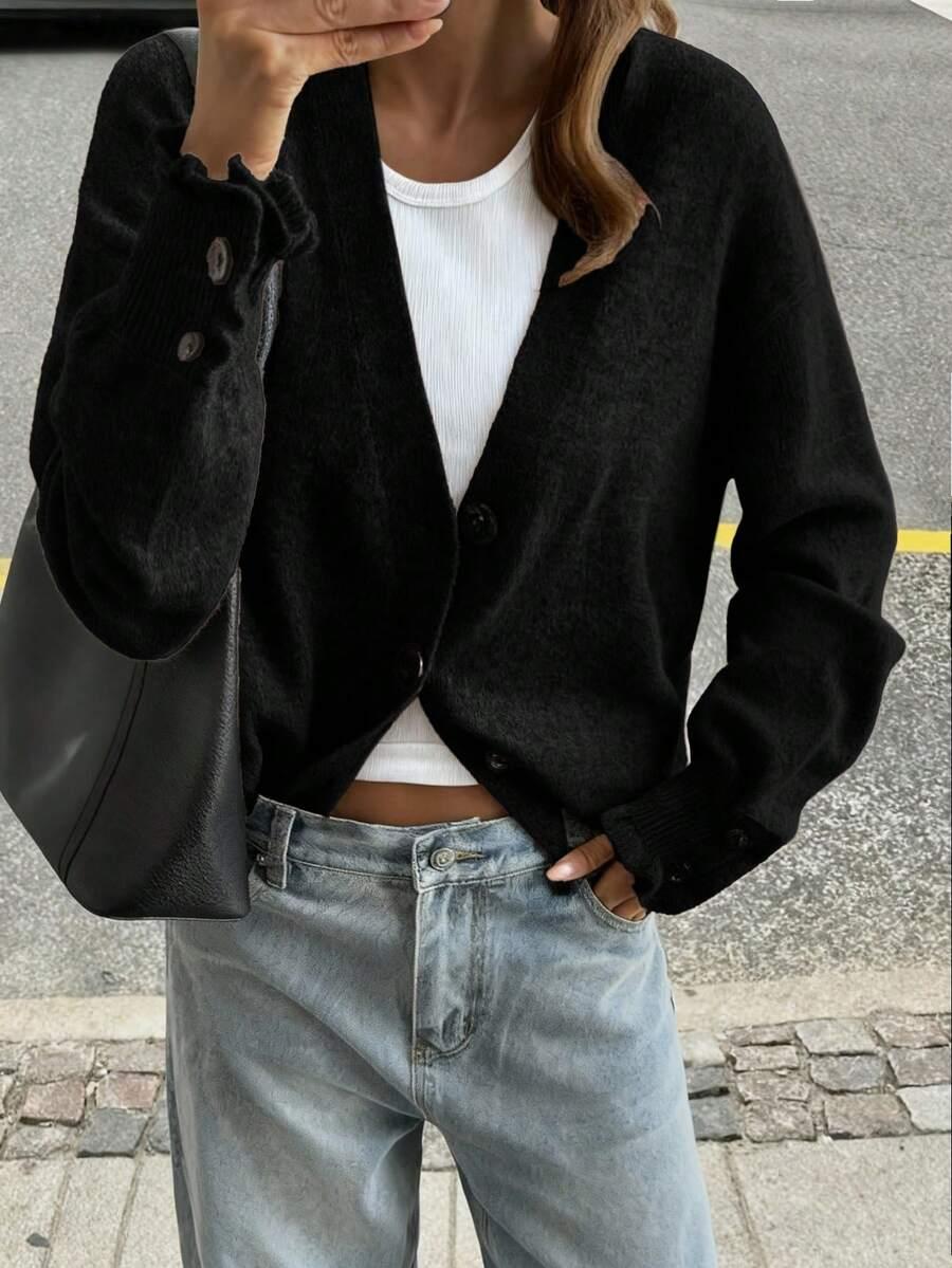 CZARNY SWETER GUZIKI