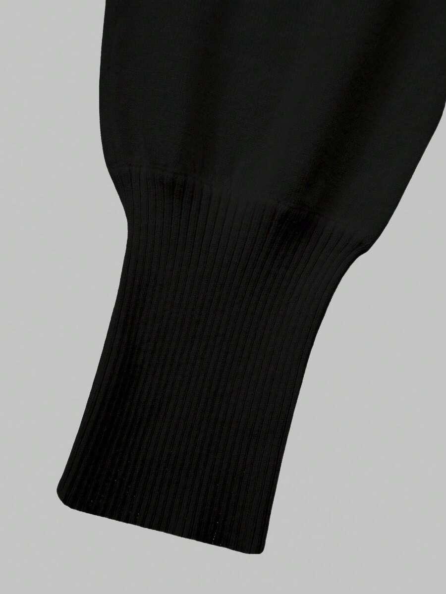 czarny sweter asymetria