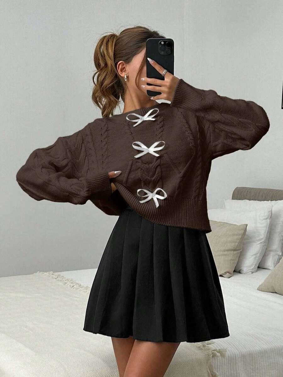 brązowy sweter kokardy
