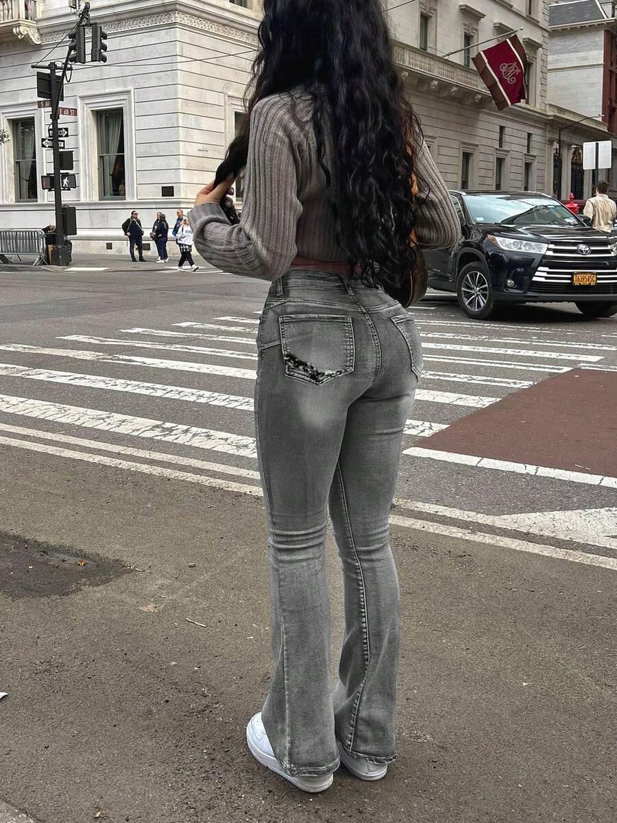 szare jeansy zamek