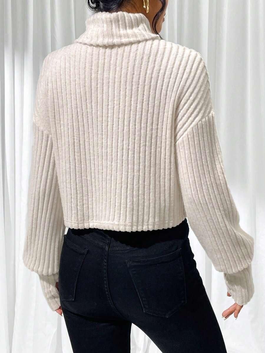 beżowy sweter golf