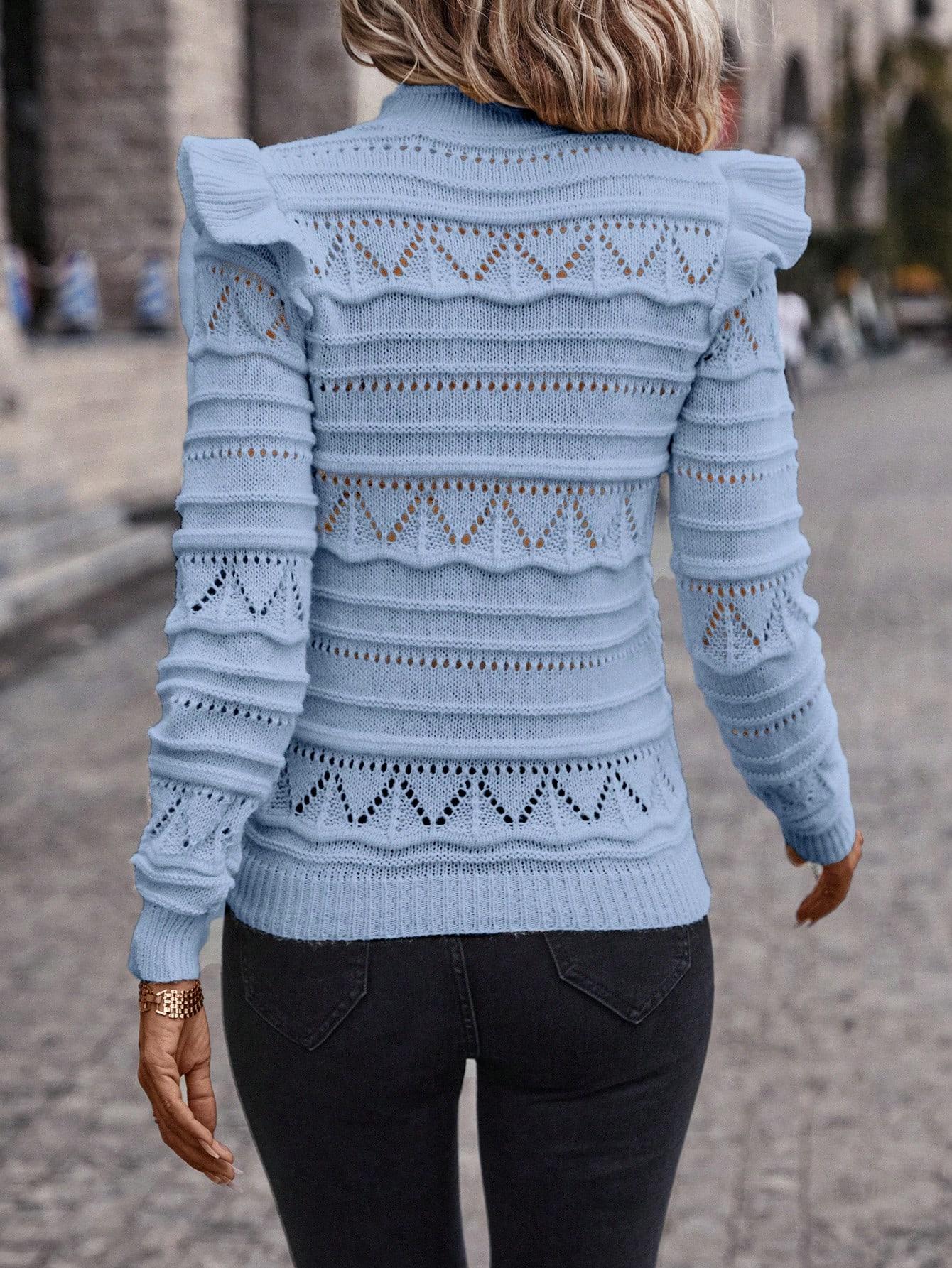 ażurowy sweter stójka falbany