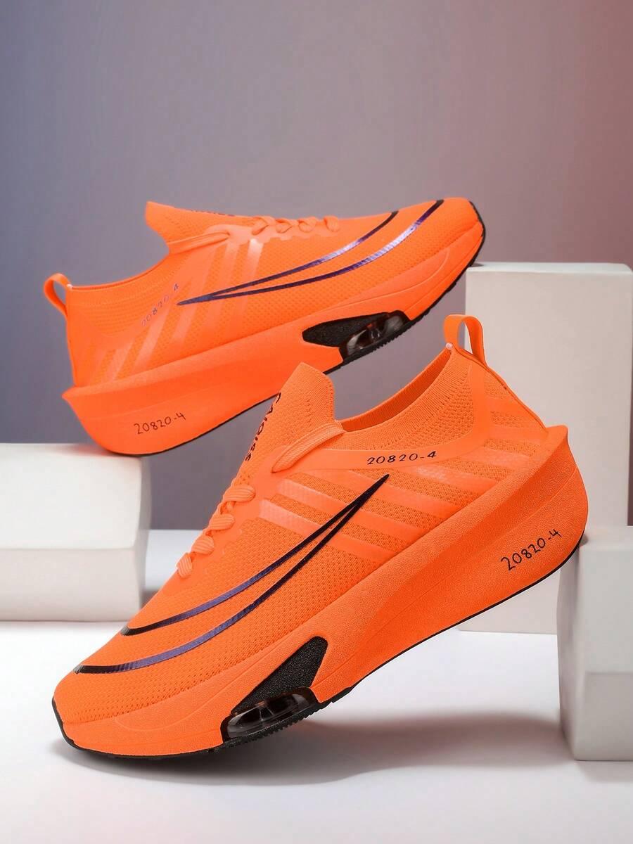 pomarańczowe buty sportowe