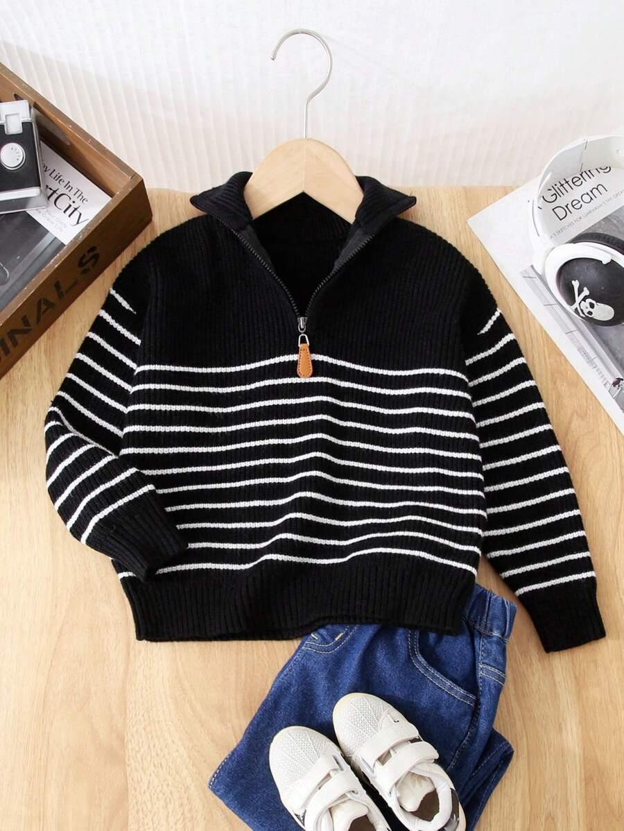 czarny sweter paski