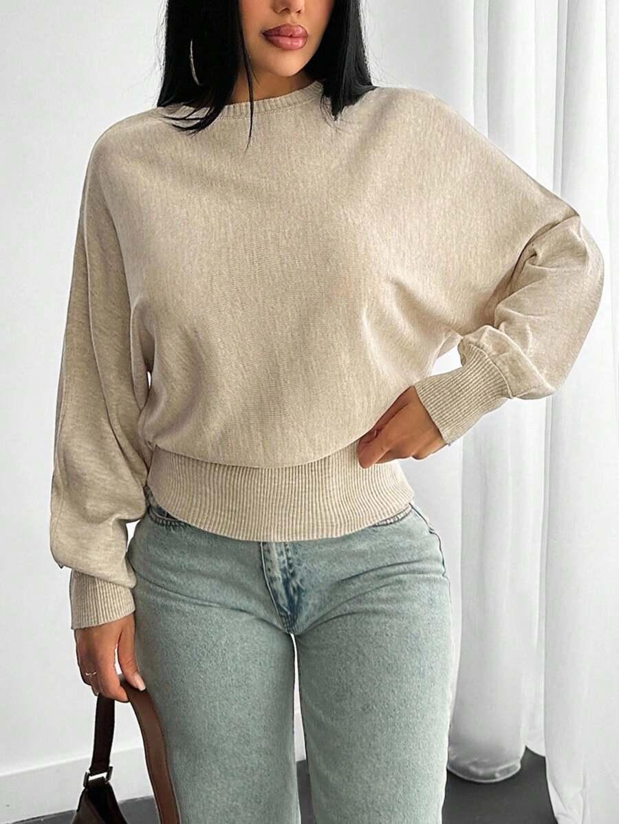 beżowy dzianinowy sweter 