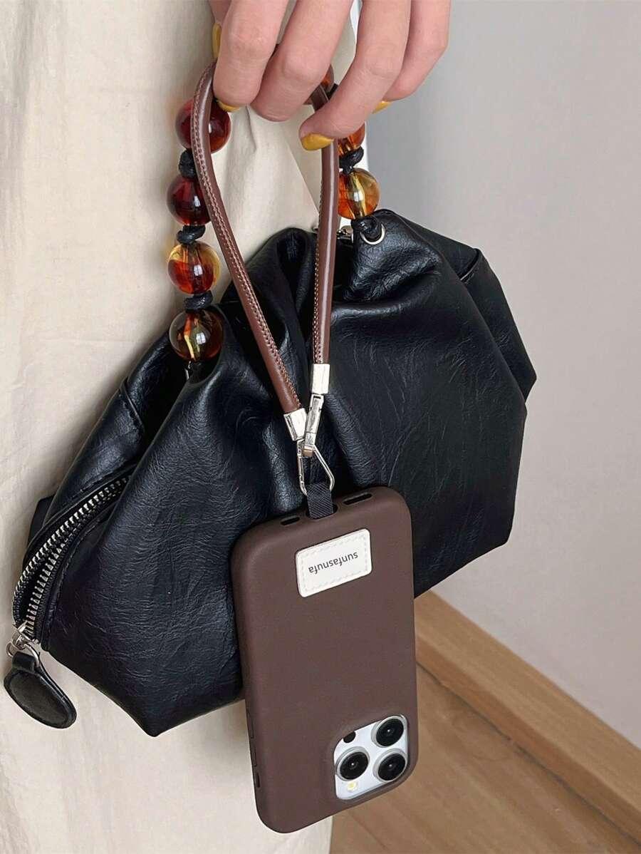 brązowe etui na telefon 