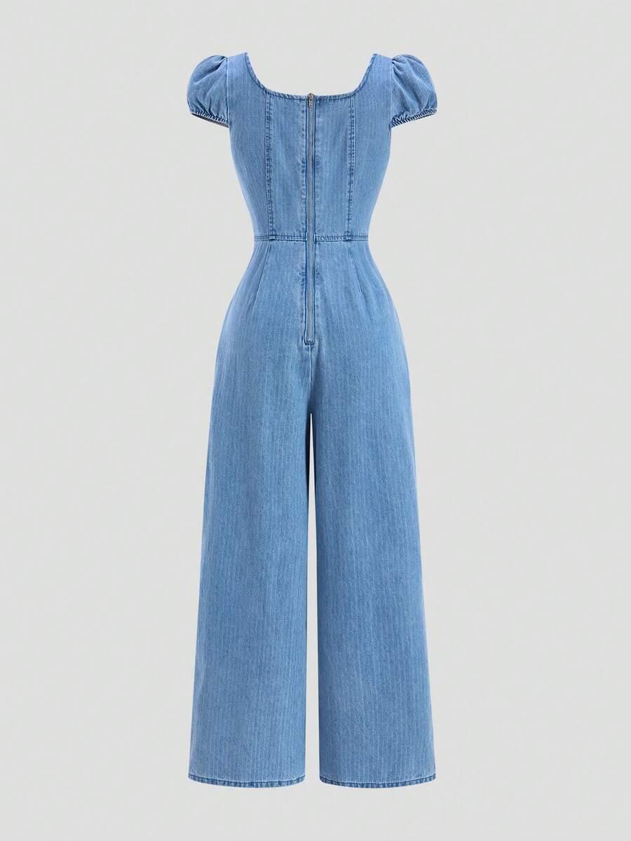 niebieski kombinezon jeans