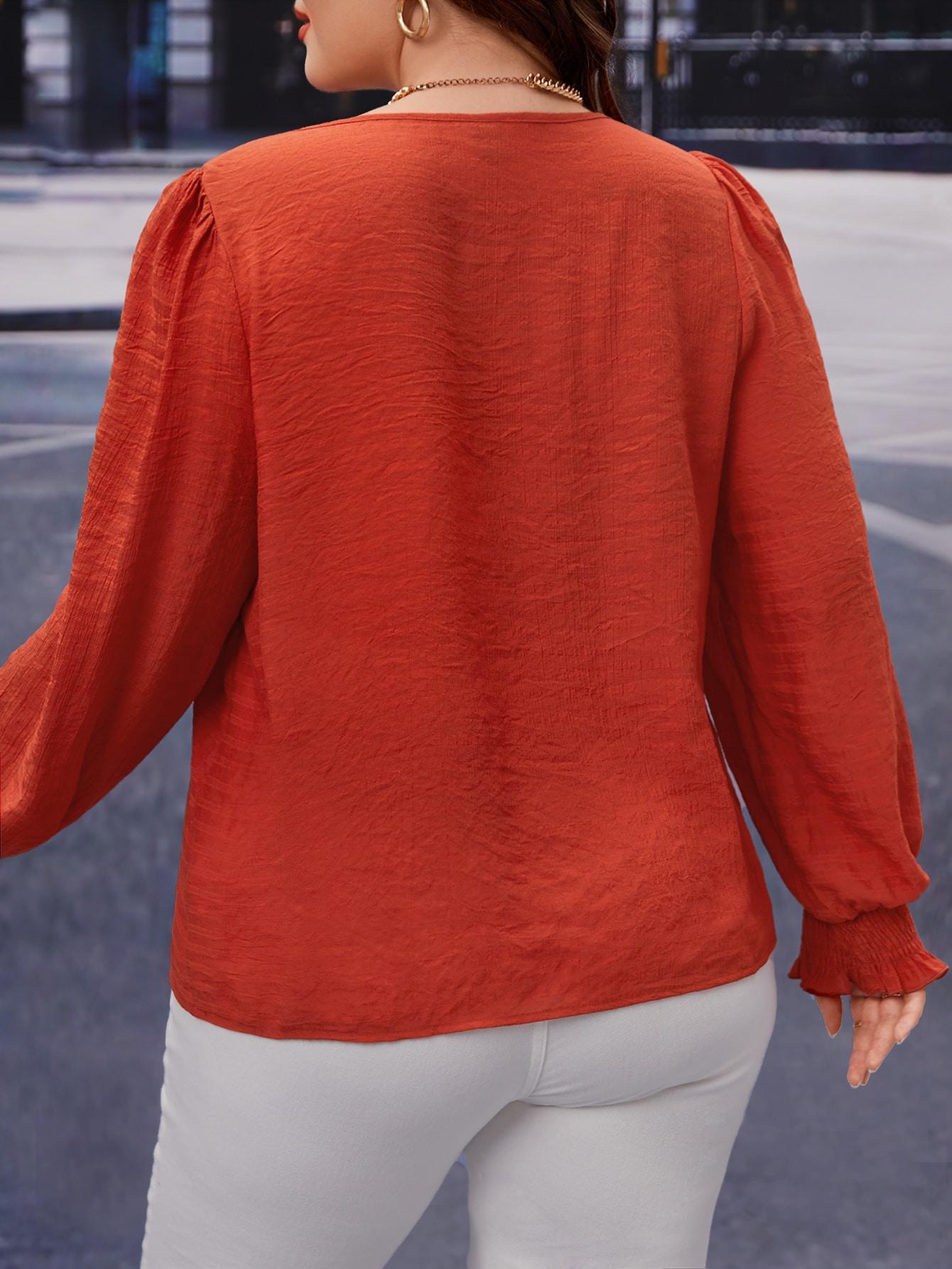 pomarańczowa luźna bluzka długi rękaw 
