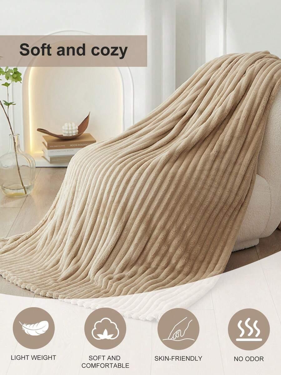 beżowy koc prążki