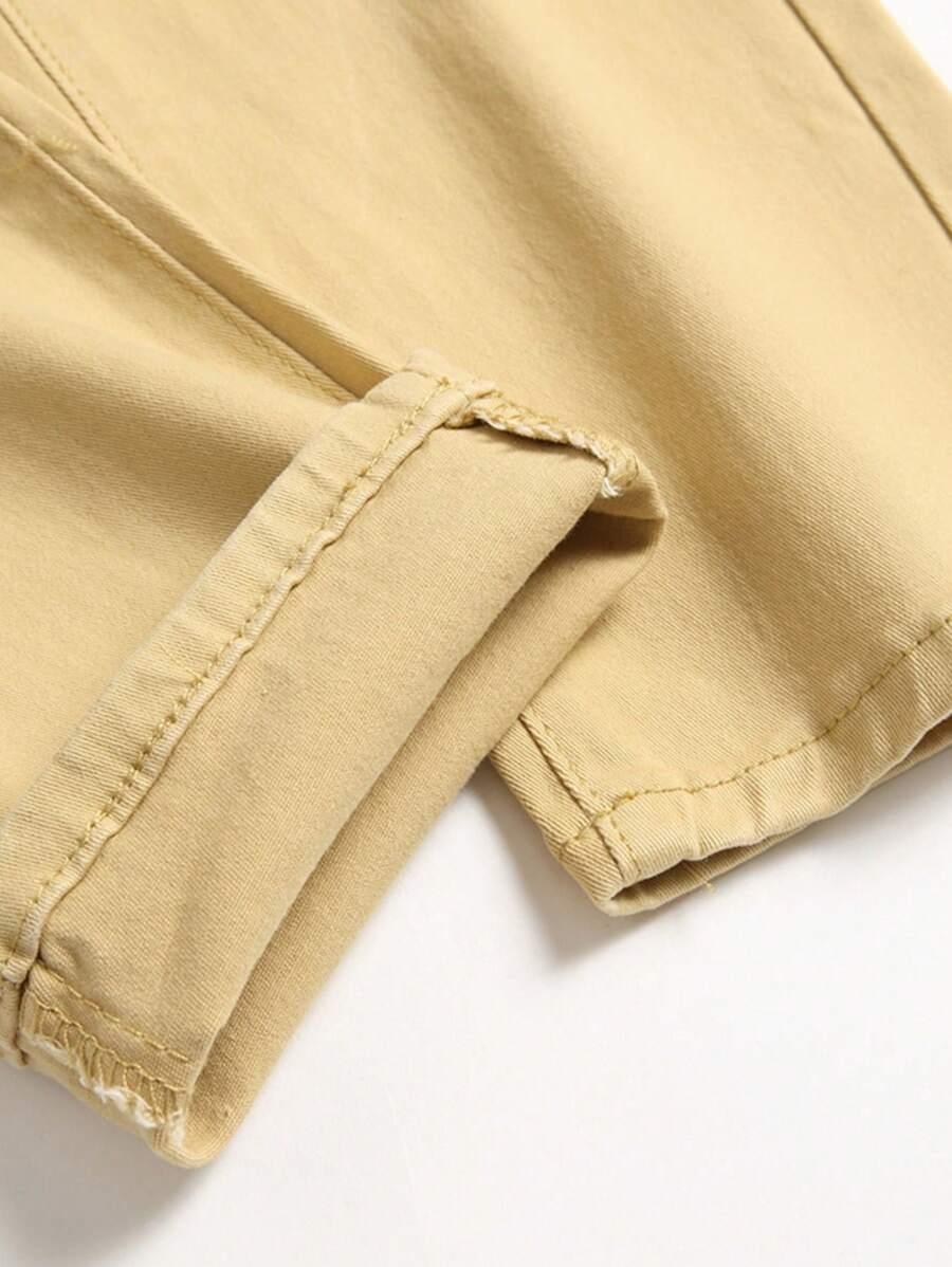 zielone spodnie rurki jeans kieszenie zamek