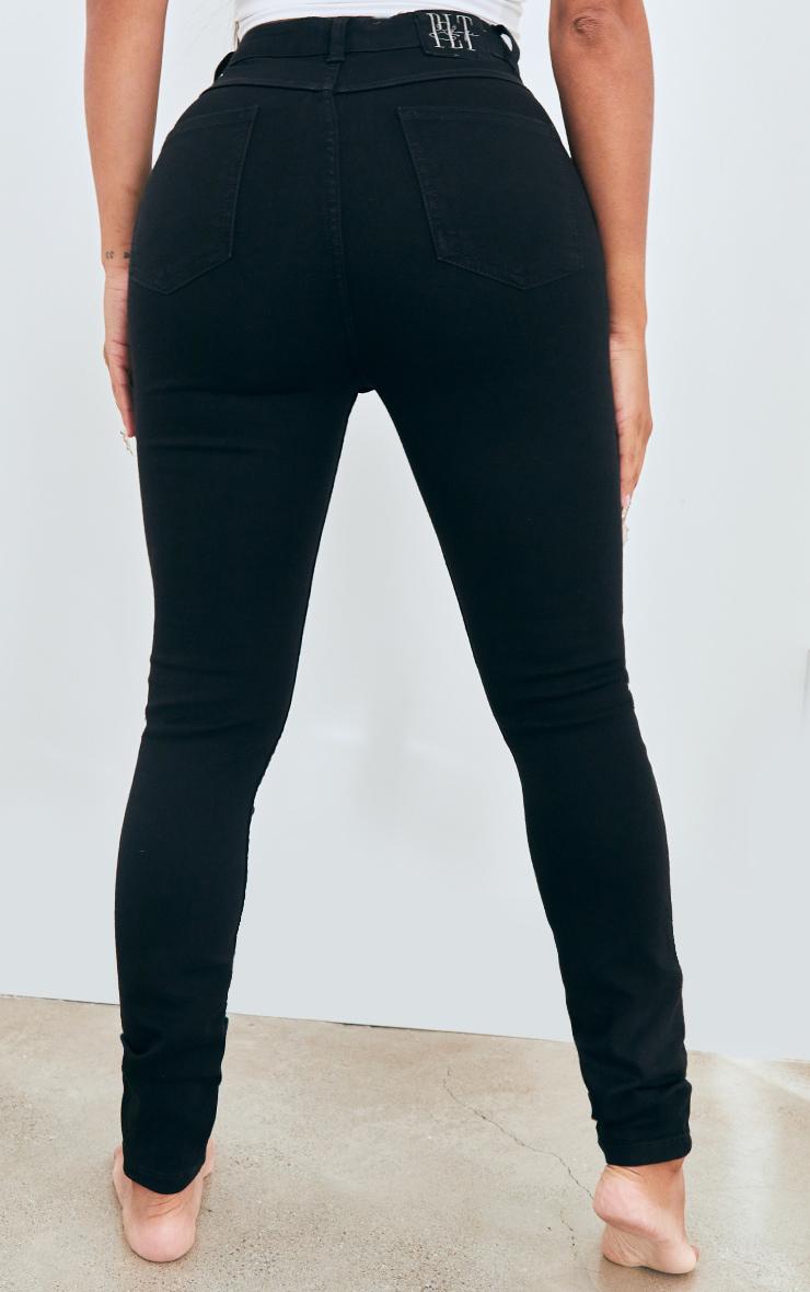 czarne spodnie jeansowe rurki wysoki stan