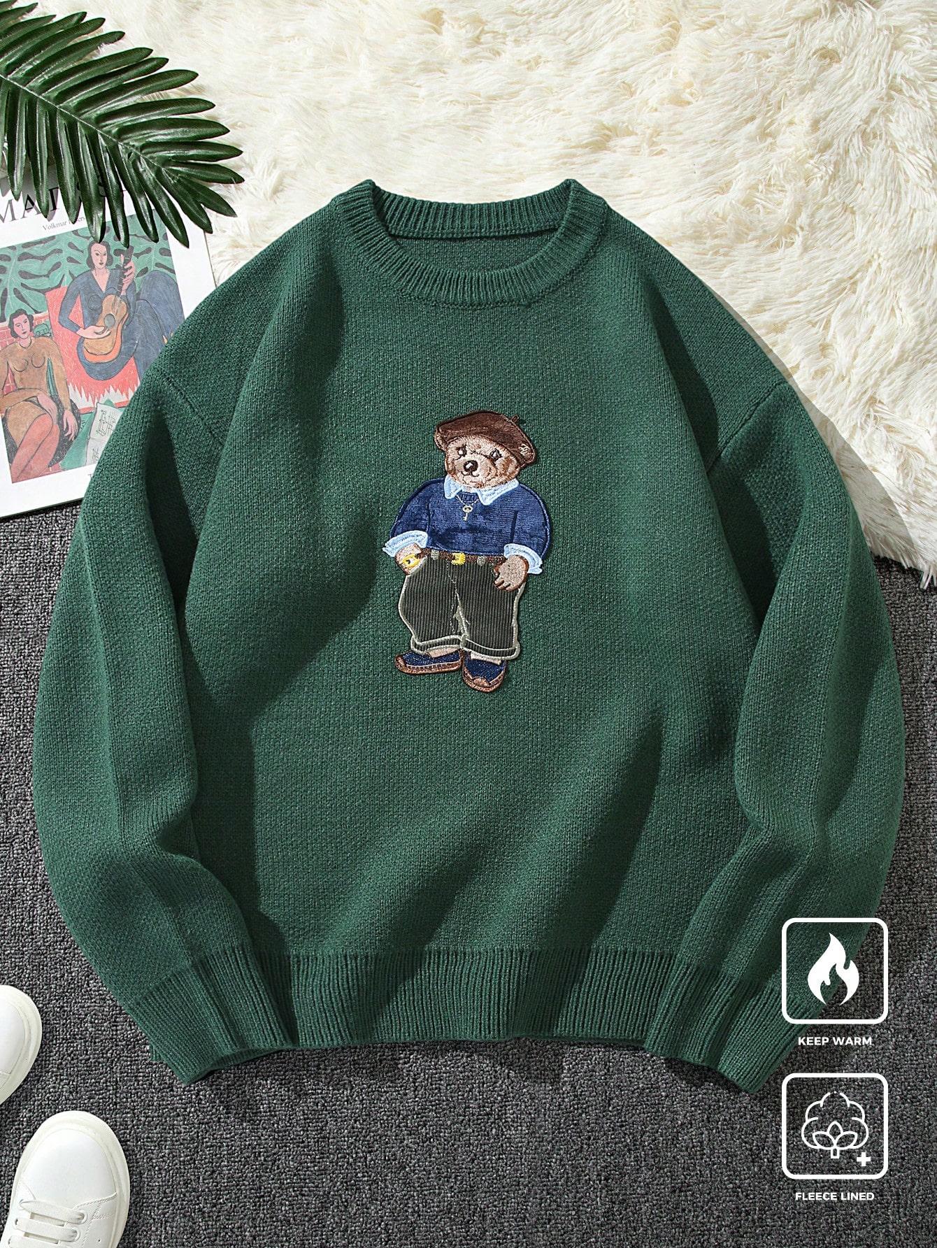 SWETER Z NADRUKIEM DAMSKI