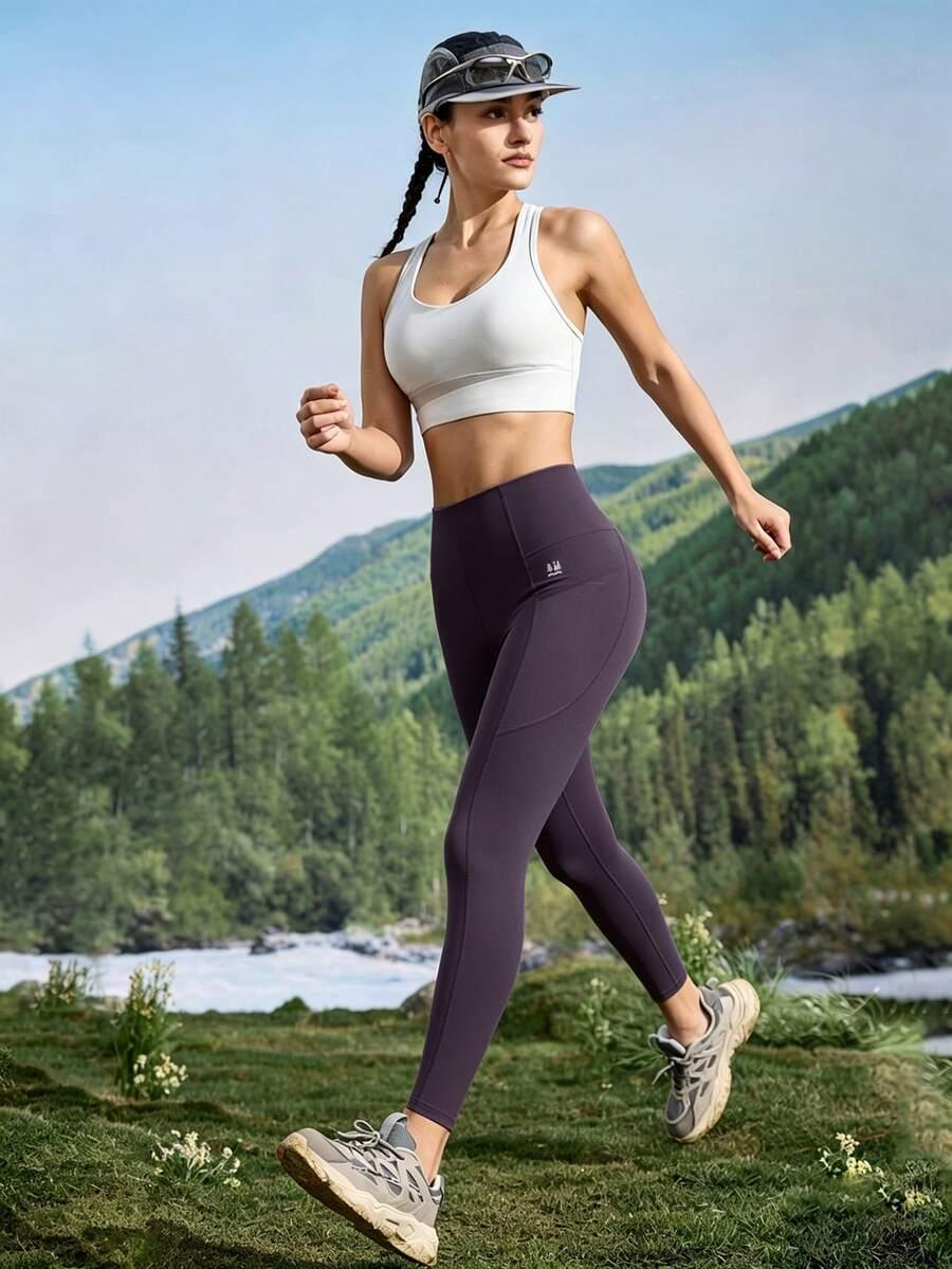 fioletowe legginsy kieszenie