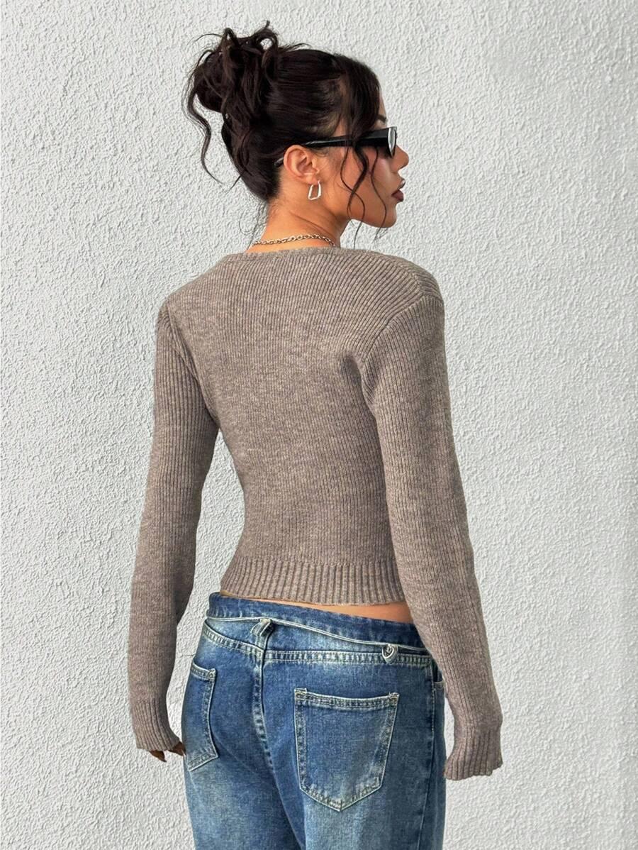 beżowy sweter prążki