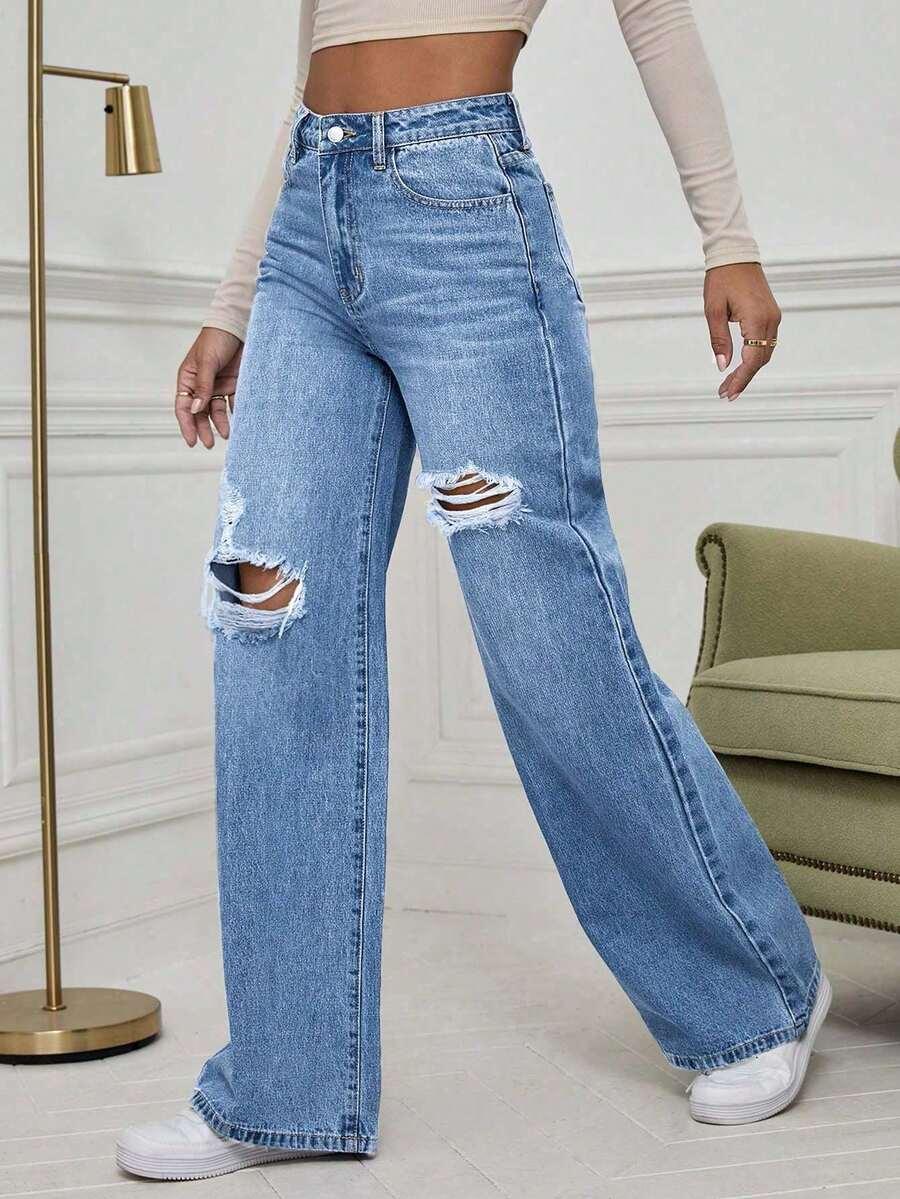 SPODNIE JEANS PRZETARCIA 